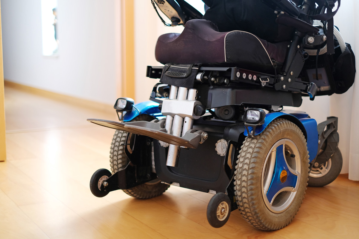 A blue and black power wheelchair in El Paso.